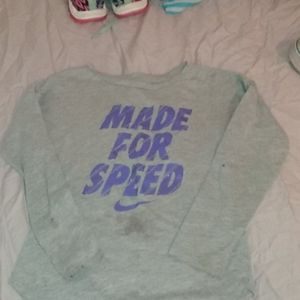 A Nike long sleeve t-shirt and star tights